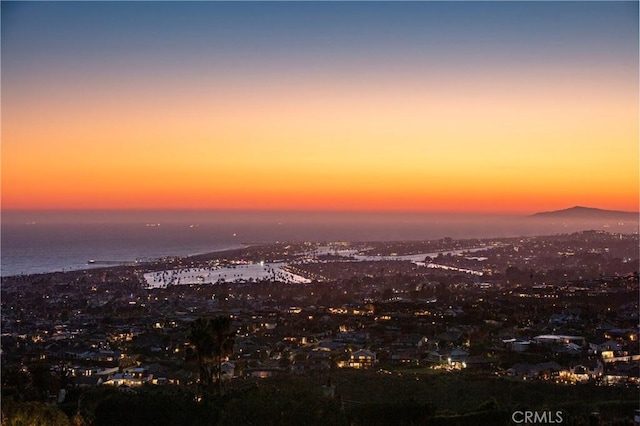 view of city with a water and mountain view