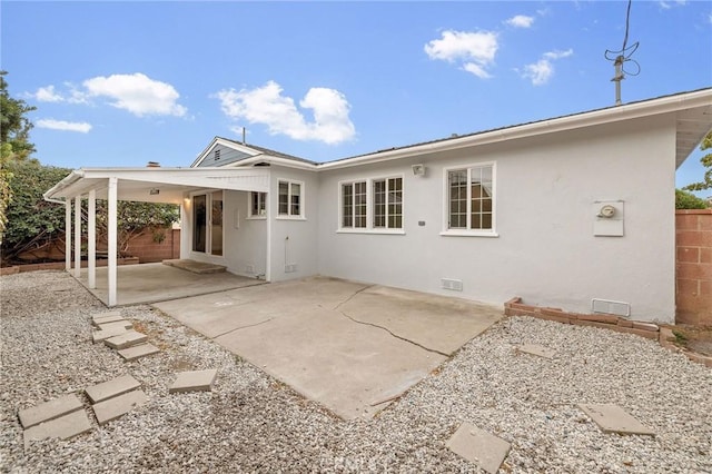 18017 Glenburn Ave, Torrance, CA 90504 - back of house featuring fence, a patio area, crawl space, and stucco siding
