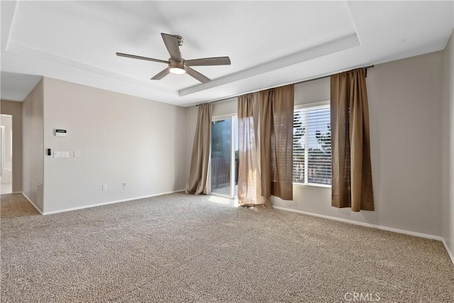 42631 Hussar Ct, Temecula, CA 92592 - unfurnished room featuring a tray ceiling, a ceiling fan, and carpet