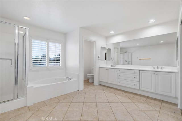 42631 Hussar Ct, Temecula, CA 92592 - bathroom with toilet, a shower stall, double vanity, tile patterned floors, and a garden tub