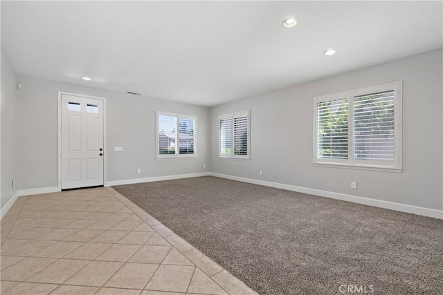 42631 Hussar Ct, Temecula, CA 92592 - entryway featuring plenty of natural light, light tile patterned floors, recessed lighting, and baseboards