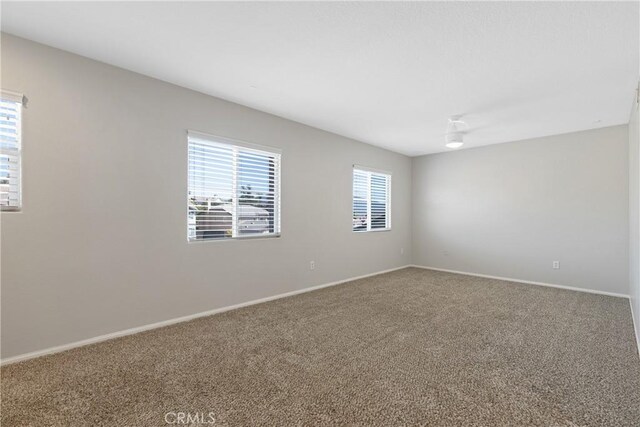 42631 Hussar Ct, Temecula, CA 92592 - carpeted spare room with baseboards
