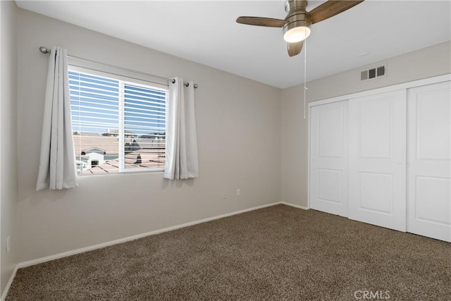 42631 Hussar Ct, Temecula, CA 92592 - unfurnished bedroom with carpet, a closet, baseboards, and a ceiling fan