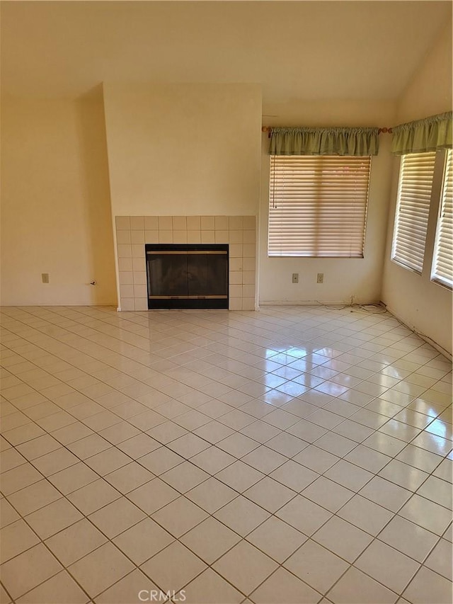40132 Zamura Ct, Murrieta, CA 92562 - unfurnished living room featuring light tile patterned flooring and a fireplace