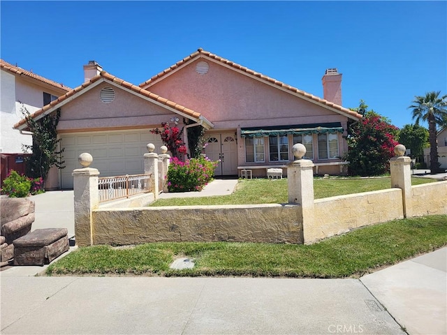 40132 Zamura Ct, Murrieta, CA 92562 - view of front of property with a chimney, a fenced front yard, an attached garage, stucco siding, and a tiled roof