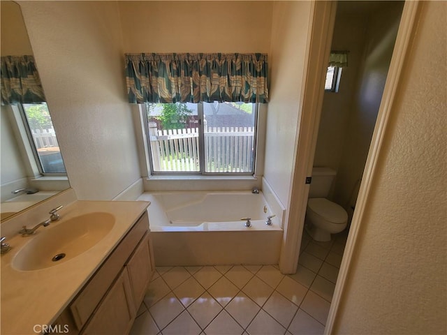 40132 Zamura Ct, Murrieta, CA 92562 - full bathroom featuring tile patterned flooring, toilet, a bath, vanity, and a textured wall