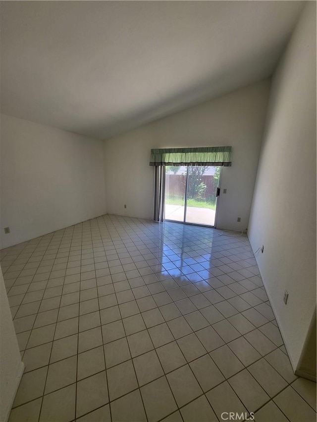 40132 Zamura Ct, Murrieta, CA 92562 - empty room with light tile patterned flooring and lofted ceiling
