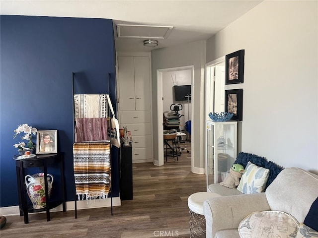 26261 Melba Ave, Homeland, CA 92548 - living area with attic access, wood finished floors, and baseboards