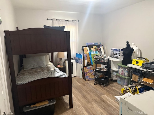 26261 Melba Ave, Homeland, CA 92548 - bedroom featuring wood finished floors
