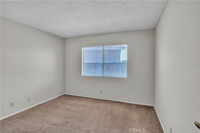29331 Mawr Ct, Menifee, CA 92586 - carpeted empty room with baseboards and a textured ceiling
