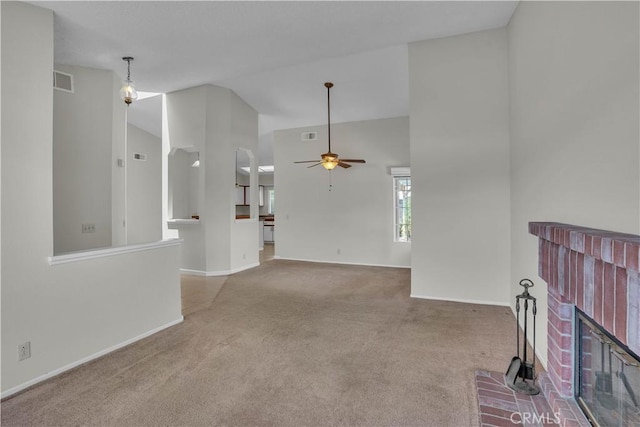 29331 Mawr Ct, Menifee, CA 92586 - unfurnished living room featuring carpet floors, a ceiling fan, vaulted ceiling, a fireplace, and baseboards