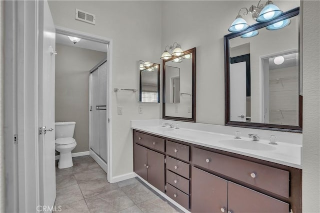 29331 Mawr Ct, Menifee, CA 92586 - full bath with double vanity, toilet, a shower with door, and tile patterned flooring