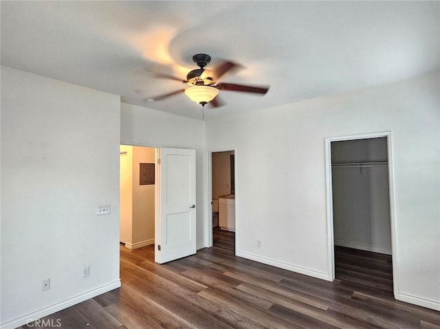 7331 Shelby Pl Unit 121, Rancho Cucamonga, CA 91739 - unfurnished bedroom featuring dark wood-style floors, a spacious closet, baseboards, a closet, and ceiling fan