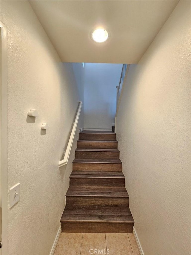 7331 Shelby Pl Unit 121, Rancho Cucamonga, CA 91739 - staircase featuring tile patterned flooring and baseboards