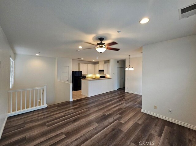 7331 Shelby Pl Unit 121, Rancho Cucamonga, CA 91739 - unfurnished living room with dark wood-style flooring, recessed lighting, a ceiling fan, and baseboards