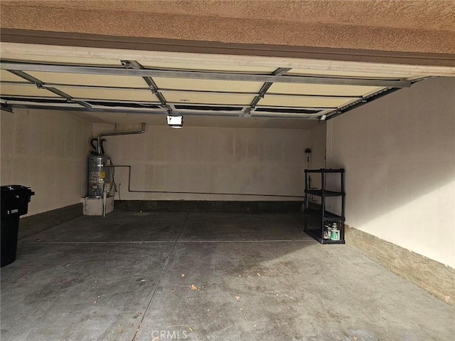 7331 Shelby Pl Unit 121, Rancho Cucamonga, CA 91739 - garage featuring strapped water heater
