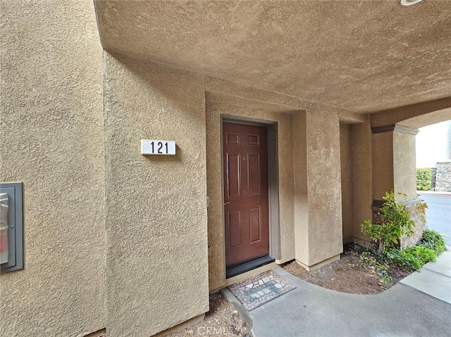 7331 Shelby Pl Unit 121, Rancho Cucamonga, CA 91739 - view of exterior entry featuring stucco siding