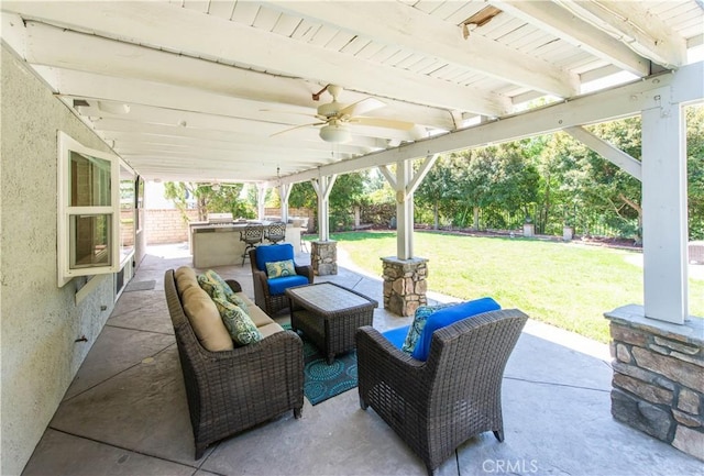 view of patio / terrace featuring a ceiling fan and an outdoor hangout area