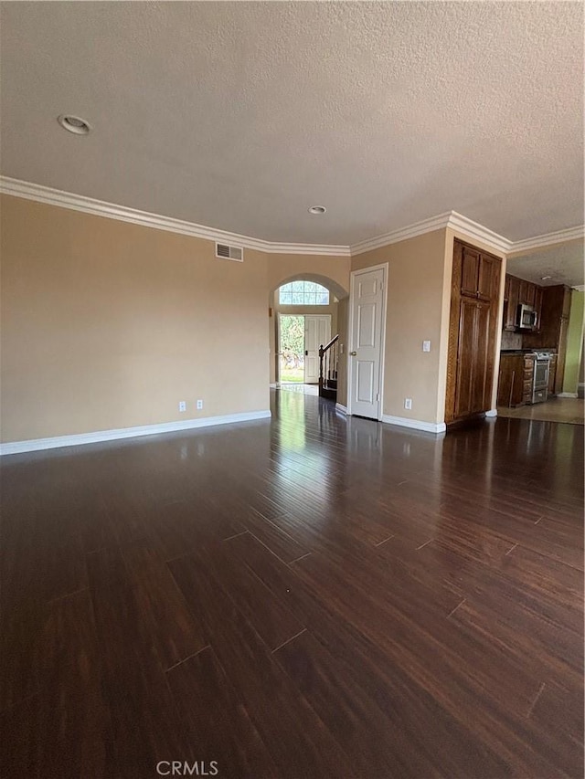 17092 Whispering Brook Way, Riverside, CA 92503 - unfurnished living room featuring arched walkways, a textured ceiling, baseboards, dark wood-style flooring, and crown molding
