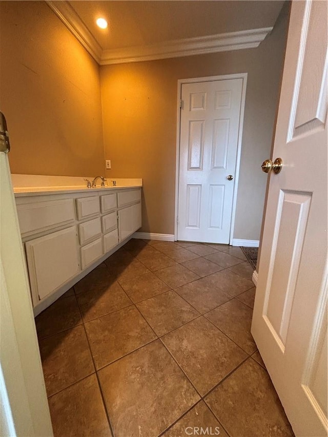 17092 Whispering Brook Way, Riverside, CA 92503 - bathroom with crown molding, tile patterned floors, baseboards, vanity, and recessed lighting