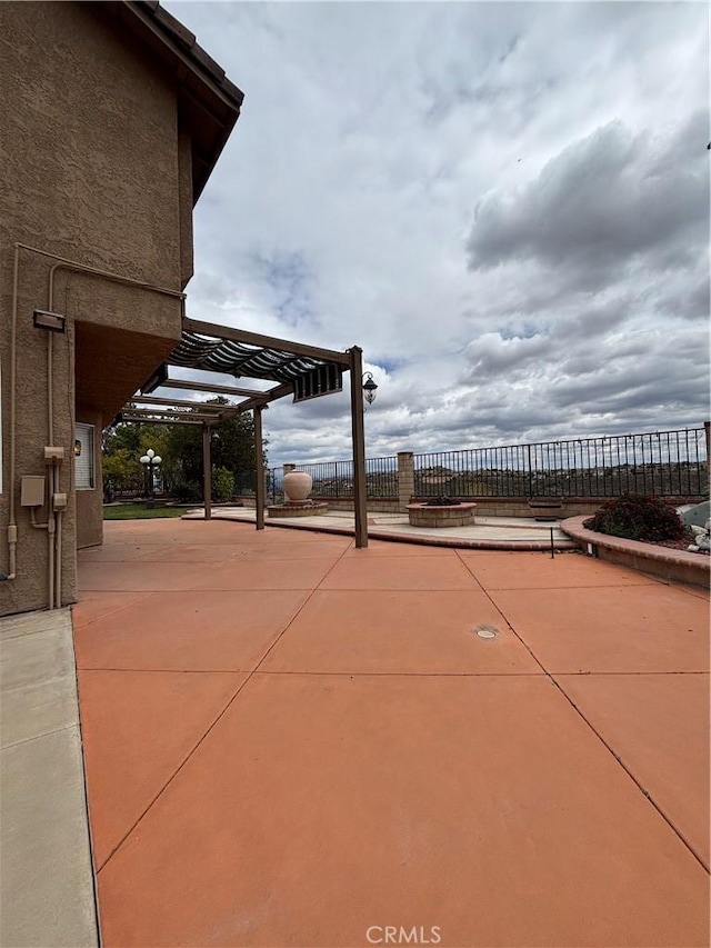 17092 Whispering Brook Way, Riverside, CA 92503 - view of patio / terrace featuring a pergola and fence