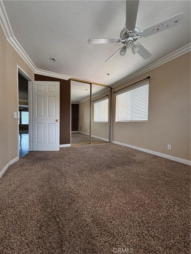 17092 Whispering Brook Way, Riverside, CA 92503 - unfurnished bedroom featuring ornamental molding, carpet floors, baseboards, a closet, and a textured ceiling