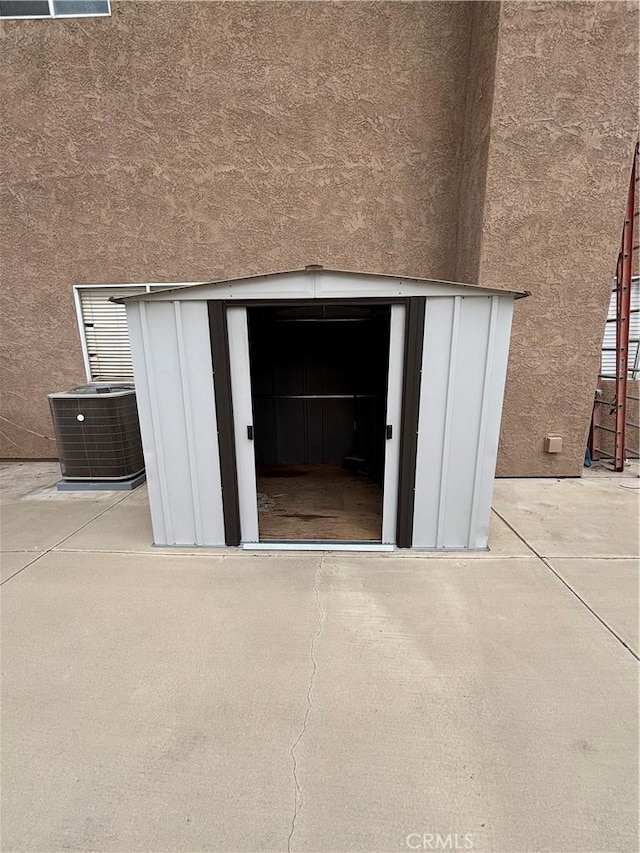 17092 Whispering Brook Way, Riverside, CA 92503 - view of outdoor structure with central AC unit