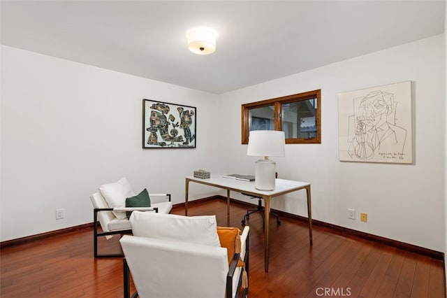 home office featuring baseboards and hardwood / wood-style floors