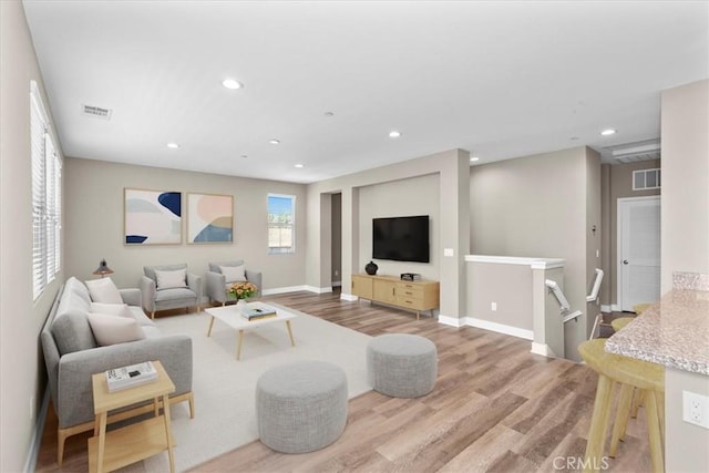 7501 Eagle Dr Unit 101, Santee, CA 92071 - living area featuring wood finished floors, recessed lighting, and baseboards