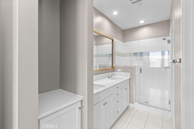 7501 Eagle Dr Unit 101, Santee, CA 92071 - full bathroom featuring a shower stall, tile patterned flooring, double vanity, and recessed lighting