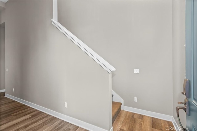 7501 Eagle Dr Unit 101, Santee, CA 92071 - foyer with wood finished floors, stairway, and baseboards