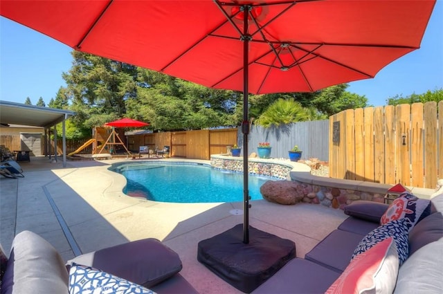 324 Crater Lake Dr, Chico, CA 95973 - view of swimming pool featuring a playground, a fenced backyard, a patio, and an outdoor hangout area