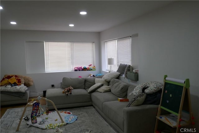 living room featuring recessed lighting
