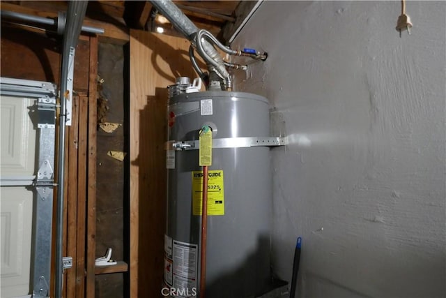utility room with strapped water heater