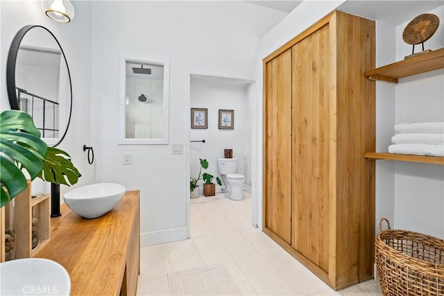 249 Calle Empalme, San Clemente, CA 92672 - full bathroom with toilet, baseboards, tile patterned flooring, and vanity