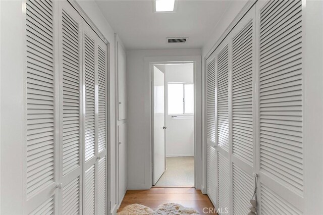 5681 E Colorado St, Long Beach, CA 90814 - corridor with light wood-type flooring and baseboards
