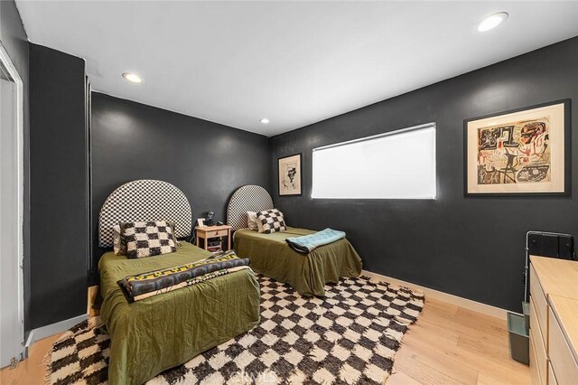 5681 E Colorado St, Long Beach, CA 90814 - bedroom with light wood-style floors, recessed lighting, and baseboards