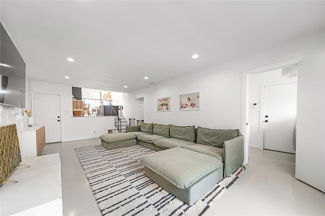 5681 E Colorado St, Long Beach, CA 90814 - living room with finished concrete floors and recessed lighting