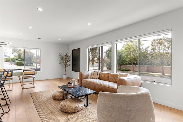 5681 E Colorado St, Long Beach, CA 90814 - living area with recessed lighting, baseboards, and light wood-type flooring