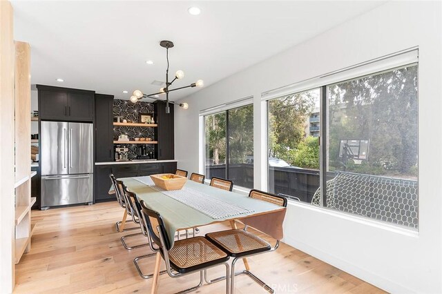 5681 E Colorado St, Long Beach, CA 90814 - dining room with a chandelier, recessed lighting, and light wood-type flooring
