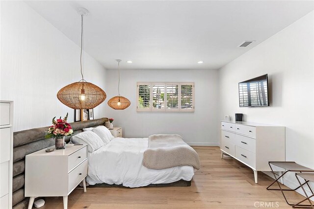5681 E Colorado St, Long Beach, CA 90814 - bedroom with light wood-type flooring, recessed lighting, and baseboards