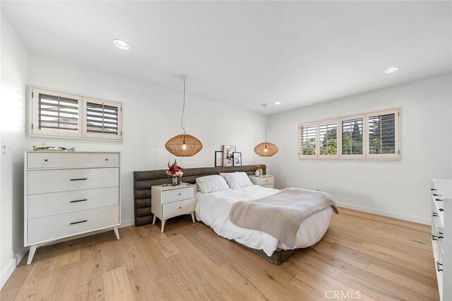 5681 E Colorado St, Long Beach, CA 90814 - bedroom with light wood-style floors, baseboards, and recessed lighting