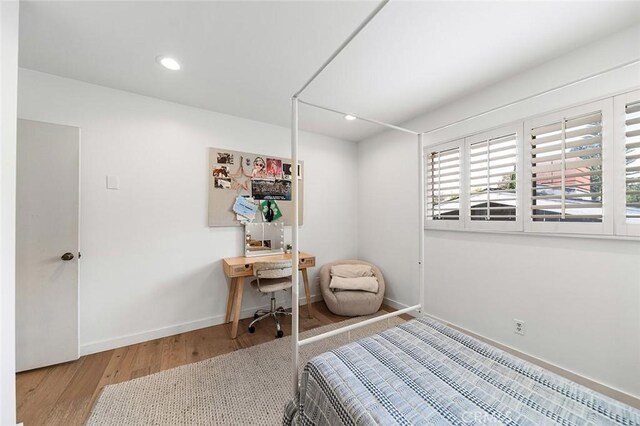 5681 E Colorado St, Long Beach, CA 90814 - bedroom featuring wood finished floors, baseboards, and recessed lighting