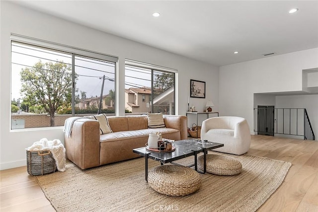 5681 E Colorado St, Long Beach, CA 90814 - living area featuring wood finished floors, recessed lighting, and baseboards