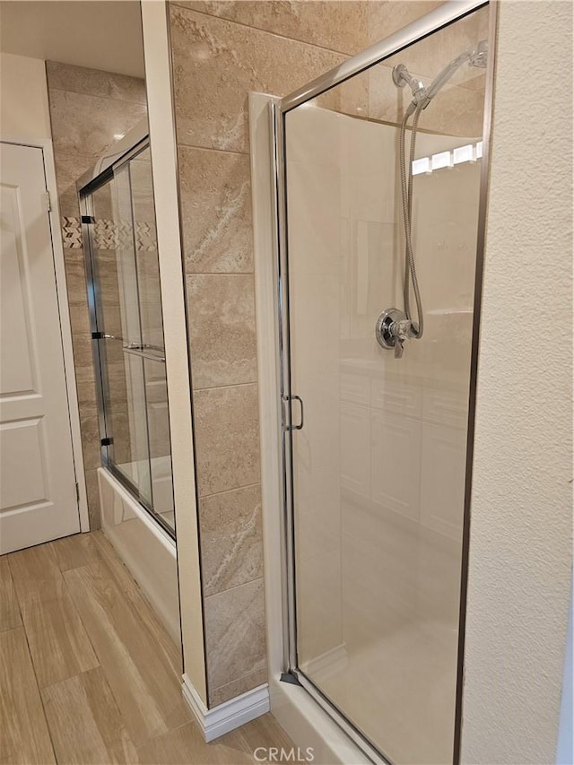 9315 Woodman Ave Unit 8, Arleta, CA 91331 - bathroom featuring shower / bath combination with glass door