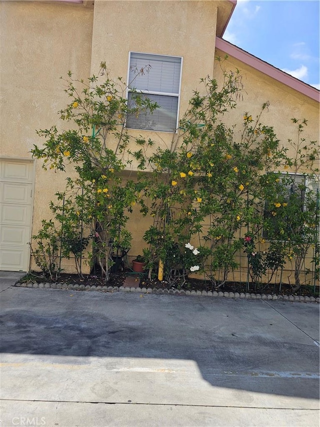 9315 Woodman Ave Unit 8, Arleta, CA 91331 - view of side of home with stucco siding