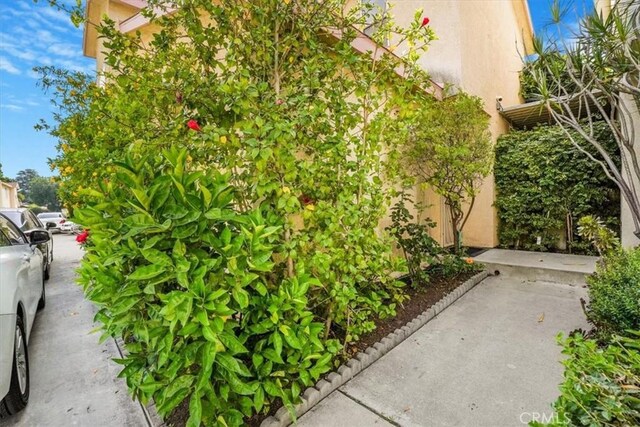 9315 Woodman Ave Unit 8, Arleta, CA 91331 - view of property exterior featuring stucco siding