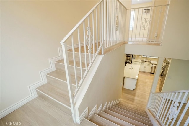 9315 Woodman Ave Unit 8, Arleta, CA 91331 - staircase with wood finished floors