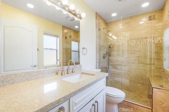 9315 Woodman Ave Unit 8, Arleta, CA 91331 - bathroom featuring vanity, toilet, a stall shower, and recessed lighting