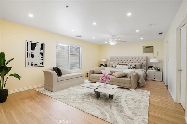 9315 Woodman Ave Unit 8, Arleta, CA 91331 - bedroom with light wood-style flooring, recessed lighting, a wall mounted air conditioner, baseboards, and a ceiling fan